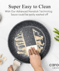 Eight Inch Nonstick Granite Frying Pan With Eco Safe Pfoa And Pfos Free Coating For Healthier Everyday Cooking being cleaned.