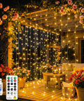 Outdoor patio decorated with Cozy Bedroom Curtain Lights 200 LED Fairy String Lights 6.6x6.6 Feet Warm White With Remote
