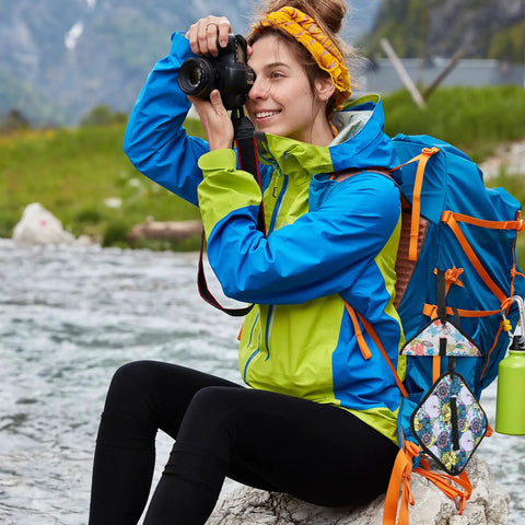 Woman hiking with backpack carrying 3 Pack Pee Cloths For Women Hiking Soft Absorbent Reusable Toilet Paper Washable For Camping Outdoor Travel