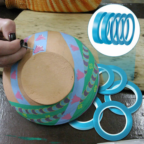 Artist using Automotive Masking Tape Set For Curves And Fine Edges, Pro Grade High Temperature Vinyl Tape With Low Tack, 5 Rolls, Blue.
