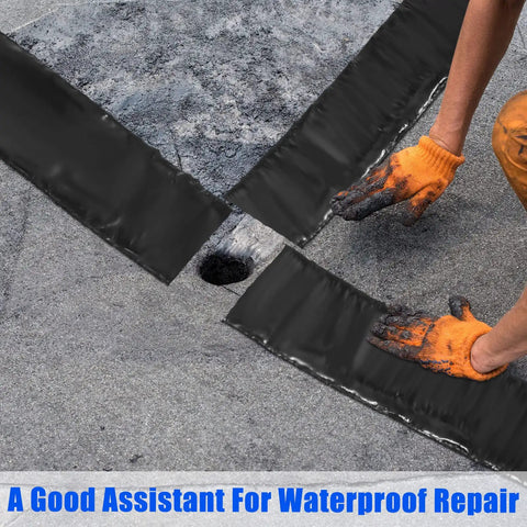 Two Rolls Asphalt Crack Filler Tape, 3.15 Inch Wide, 50 Feet Each being applied to a road surface by a person in gloves