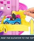Close-up of RacerVerse Barbie Spiral Track Set with Barbie Malibu and Barbie Brooklyn cars on yellow elevator track.