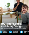 Bonk Free Household Furniture Edge Guard For Baby Proofing And 16 Foot Pre Taped Clear Corner Protectors To Cushion sharp edges on modern table with smiling toddler.