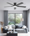 Sleek 52 Inch Black Flush Mount Ceiling Fan With Low Profile Frame And Soft Ambient Lighting Delivers Solid Airflow Without Dropping Down Or Cluttering Your Space in a modern living room.