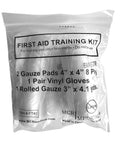 First aid training kit by MCR Medical; clear bag contains 2 gauze pads 4x4 in, 1 pair vinyl gloves, 1 rolled gauze 3 in x 4.1 yds