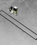 32 Inch Linear Shower Drain With Tiled Insert, 304 Stainless Steel Brushed Finish, visible on tiled floor