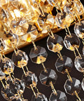 Close-up of Brass Wall Sconce With Crystal Strings And Glass Bars Dimmable Two Layer Light Head Adjustable Beam Lit Glam Lighting