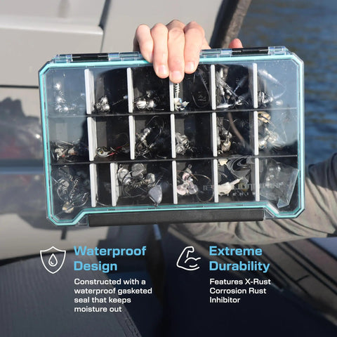 Person holding a BallistiX 3.6 Tackle Tray Waterproof Lure Box With Clear Lid And Rust Inhibitor Built Tough Anti Corrosion.