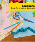 Crafting supplies with scissors, pencils, ribbon, buttons, and paper for DIY projects with Double Sided Craft Tape 1/2 Inch Wide By 300 Inch Long Permanent Adhesive For Scrapbooks, Cards, School Projects, And Paper Crafts, Strong Hold, Easy Dispenser, Ideal For DIY Projects.