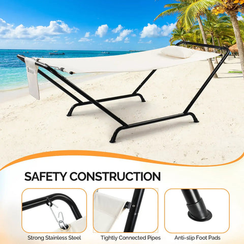 Freestanding Outdoor Hammock With Stand For Your Yard Deck Or Patio Built Tough With 600 Pound Capacity Rust Proof Stainless Steel Connectors Includes Soft Pillow And Handy Storage Bag White on a beach