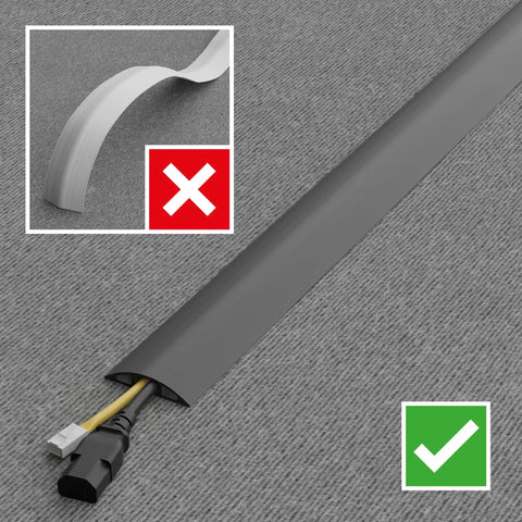 No Sweat Six Foot Floor Cable Cover And Wire Protector Channel Slick Flexible Pvc Build on gray carpet, showcasing proper usage.
