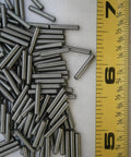 Pack of 25 M2 by 12 Alloy Steel Dowel Pins for a Multi Purpose Hardware Fastener Kit, Corrosion Resistant, Built Tough for High Temperature and Cold Weather, Mercury Free and Non Toxic, Eco Friendly Metal Fastener Set; dowel pins beside tape measure