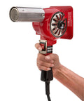 Hand holding Master-Mite Series Heat Shrink System 220V Red 300 To 500 F Range 1440W Hot Air Tool