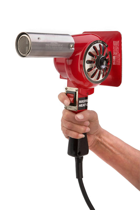 Hand holding Master-Mite Series Heat Shrink System 220V Red 300 To 500 F Range 1440W Hot Air Tool