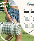 Person carrying cellophane packaged Oversized Waterproof Sandproof Beach Blanket For Picnics And Outdoor Adventures Extra Large 80x80 Inch Foldable Rug That Stays Sand Free Your Go To For Family Road Trips RV Gear And Hiking Essentials on grass