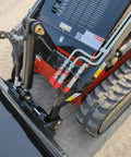 Mini Skid Steer Loader 1800 Lb Capacity, 23HP Gas EPA Engine hydraulic arm close-up on construction site