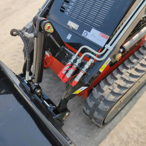 Mini Skid Steer Loader 1800 Lb Capacity, 23HP Gas EPA Engine hydraulic arm close-up on construction site