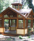 Garden gazebo with wooden lattice detailing treated with All In One Exterior Wood Stain And Sealer For Outdoor Decks And Fences No Back Brushing Needed No Fuss Easy To Apply Waterproof Sealant With UV Protection Rich Pecan Finish In 1 Gallon No Priming Required.