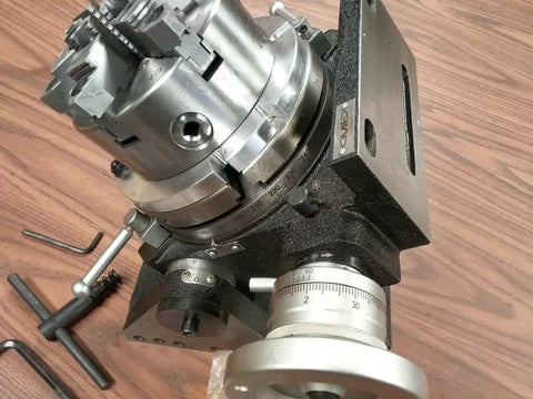 Precision Tilting Rotary Table With Six Jaw Self Centering Chuck For Dead Nuts Angular Control And Clean Sweeps On Cnc Or Manual Mill Rigs Gear Drives Zero To Ninety Degrees For That Top Shelf Accuracy, showing detailed gear adjustment.
