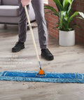 Person using Heavy Duty Loop End Cotton Dust Mop Head 36 Inches Wide Blue for cleaning hard surfaces.