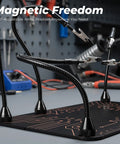 All-in-One Soldering Stand With Four Handy Helping Hands And 5X Magnifier, featuring flexible gooseneck arms in a workshop setting