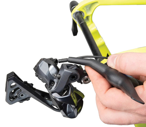 EWS1 Electronics 3 Way Tool For Bike Systems With Angled Di2 E Tube Ends For Tight Space Install And Removal in use on bike