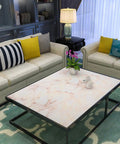 Living room with coffee table covered in Pink Marble Peel And Stick Contact Paper Matte Finish, Waterproof And Oil Proof Self Adhesive Wallpaper 17.71 By 78.74 Inches For Kitchen Counters, Furniture, Drawers, Cabinets, Crafts And DIY Renovations.