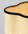 Close-up of PVC rattan shade with velvet rim on Mid Century Bohemian Tripod Floor Lamp With PVC Rattan Shade And Velvet Rim