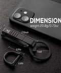Titanium Belt Clip Key Holder With Carabiner And D Ring For Men, Ultra Durable Keychain Clip next to smartphone, dimensions shown