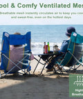 Two High Back Beach Chairs For Camping And Tailgating with mesh backrest on sandy beach, green and blue, viewed from the back.