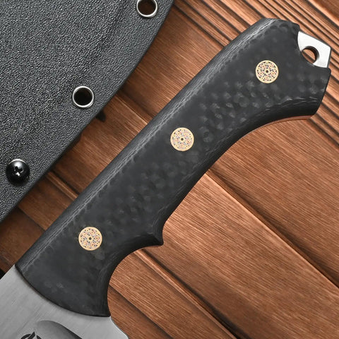Close-up of Rugged AUS 10 Fixed Blade Knife With Carbon Fiber Handle, highlighting textured grip and sheath corner
