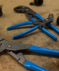 GripLock Tongue And Groove Pliers Set 6.5 Inch, 9.5 Inch, 12.5 Inch Water Pump Pliers with blue handles on a workshop table