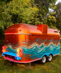 Turnkey Commercial Hot Dog Cart And Mobile Food Truck Trailer For Quick Bites Or Soft Serve With Pro Coffee Bar Setup and Rock Solid Wheels For Block Hustle, colorful design with vibrant blue and orange.