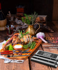 Hands-Free Wireless Meat Thermometer With Dual-Sensor Probes, 500 Ft Range, Smart App Control, Real-Time Temperature For Oven Or Grill, Rechargeable Battery, Ultra-Precise For Steaks And BBQ in use with a roast and herbs on a wooden board.