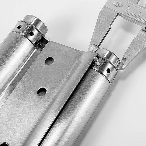 Close-up of Heavy Duty Stainless Steel Auto Closing Hinges showing brushed finish and pivot mechanism for commercial door use.