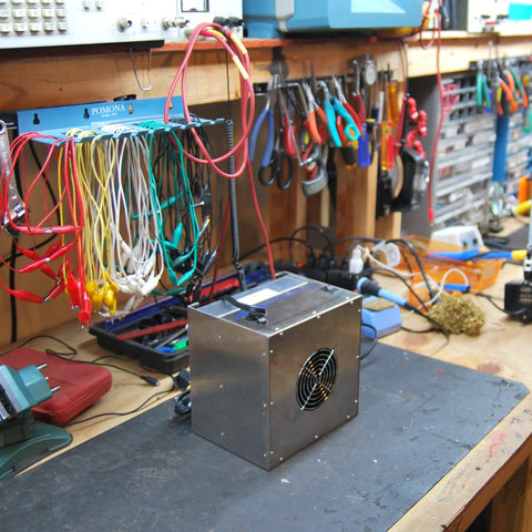 Portable Solder Smoke Fume Extractor For Soldering, Jewelry Making, And Crafting on a cluttered workbench