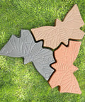 Three butterfly stepping stones made from Butterfly Stepping Stone Mold For Concrete And Cement DIY Walkway Stones Reusable Garden Path Mold