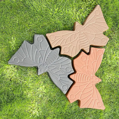 Three butterfly stepping stones made from Butterfly Stepping Stone Mold For Concrete And Cement DIY Walkway Stones Reusable Garden Path Mold