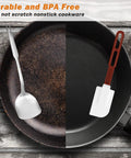 Comparison of worn metal spatula and High Temp Silicone Spatulas Set Of 2 10 Inch Heat Resistant Nonstick Spatula Scrapers With Nylon Handles NSF Certified Kitchen Must Haves For Cooking And Baking.
