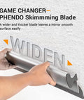 Person holding drywall skimming blade against wall, showcasing Drywall Skimming Blade Set With 12, 22, And 32 Inch Blades