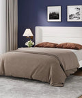 Game-Changing Queen Bed Frame With Dope White Velvet Wingback Headboard And Upholstered Platform Design Featuring Hardcore Metal Support And Thick Wood Slats For Solid Stability And Low-Key Luxury Vibes In Your Room - Elegant white velvet queen bed with decorative brown pillows in stylish bedroom.