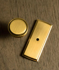 Brushed Gold Cabinet Knobs With Backplates, Zinc Alloy Kitchen Hardware on wooden surface
