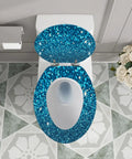 Elongated Toilet Seat Blue Glitter Resin for Bathroom on a white toilet with decorative floor tiles and flowers.