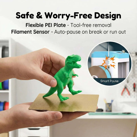 Hands holding flexible PEI plate with green dinosaur model; Kid Friendly 3D Printer For Beginners With Auto Leveling And High Speed Printing Direct Drive Extruder PLA And TPU Compatible Pre-Sliced Models On SD Card Easy Setup STEM Gift For Kids And Education