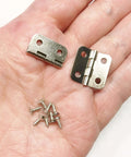 2 Piece Miniature Door Hinges With 8 Screws Steel 19x19mm Functional Open And Close For Model Or Dollhouse Building in a hand