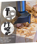 Close-up of Top Mounted Bearing Guide Kit for Router Bits in action on wood, showing bearings, screws, and cutting edge.