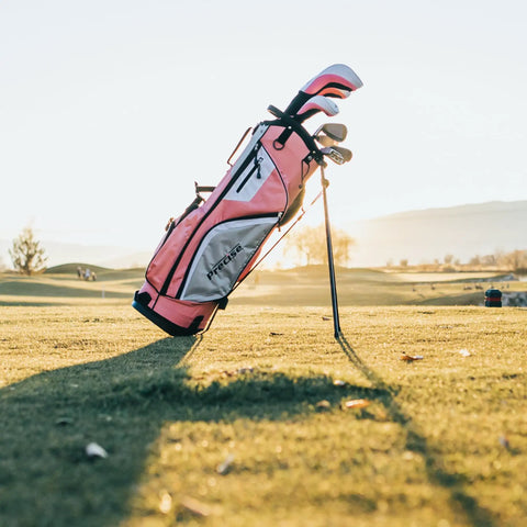 Ladies Left or Right Handed Golf Club Set For Regular And Petite Fits with pink deluxe stand bag on golf course