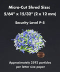 Shredded paper particles demonstrating micro-cut size for Pro Grade Auto Feed Micro Cut Paper Shredder With 200 Sheet Capacity 60 Minute Run Time High Security P5 120 Volt Jam Resistant Quiet Performance For Home Office Or Small Business.