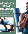 Killer 10mm Thick Yoga Mat With Big Time Cushioning Plush NBR Foam Joint Relief For Beginners Pilates Stretching Floor Workouts Includes Cinch Strap Black Exercise Equipment rolled and strapped for easy transport.