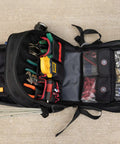 ToolPack Pro Backpack For Roofers, Electricians, Data Techs, Glaziers, And Handymen The All In One Heavy Duty Tool Bag Backpack With Ample Pockets Easy Access Durable Build And Comfortable Straps Ready For Any Job Site open showing tools.